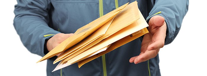 Person holding mail