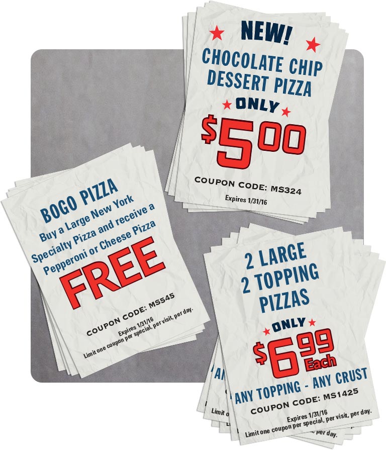 direct mail coupons on a stainless steel table