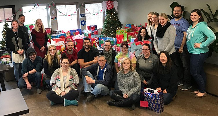 Mail Shark Group Shot in front of Salvation Army Angel Tree