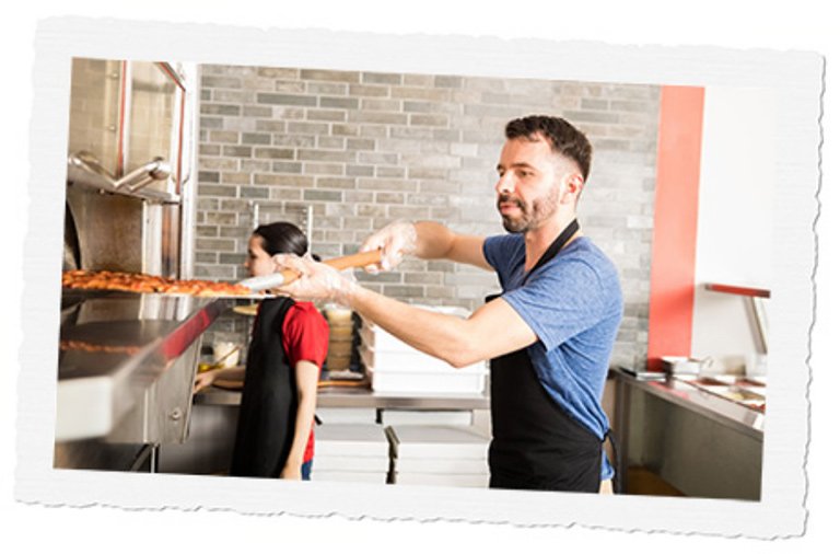 Pizza maker in kitchen